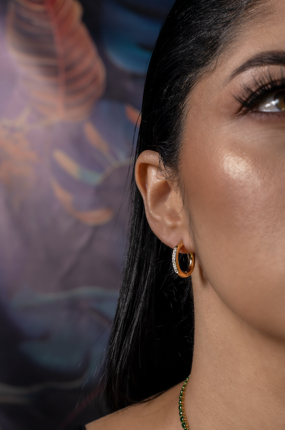 Golden circular earring